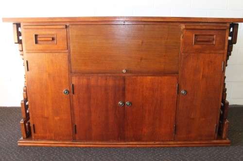 An extraordinary solid teak compact bar unit with solid green marble top and carved detailing