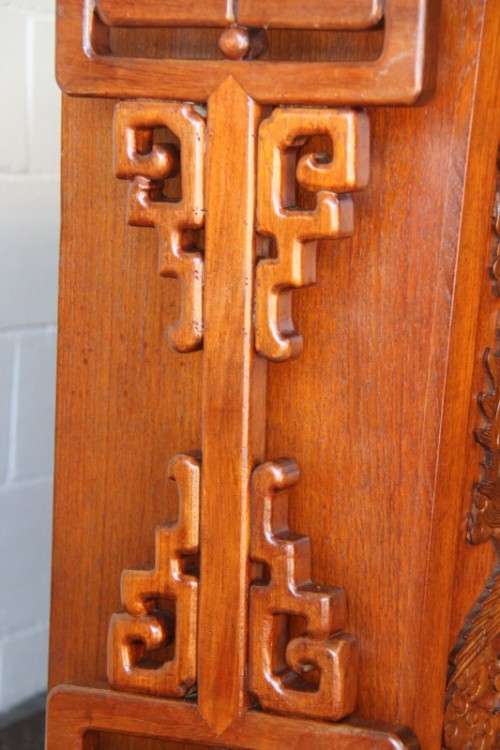 An extraordinary solid teak compact bar unit with solid green marble top and carved detailing