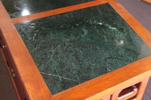 An extraordinary solid teak compact bar unit with solid green marble top and carved detailing