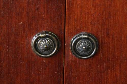 An extraordinary solid teak compact bar unit with solid green marble top and carved detailing