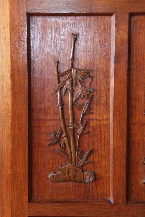 An extraordinary solid teak compact bar unit with solid green marble top and carved detailing