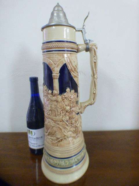 An incredible x-large Gerzit made stoneware (lidded) Stein w/ traditional hand glazed detailing