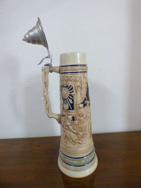 An incredible x-large Gerzit made stoneware (lidded) Stein w/ traditional hand glazed detailing