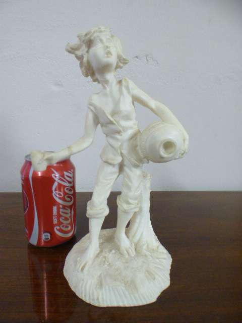 A lovely Le Ron stonelite ornamental display figurine of a young boy in great condition!!
