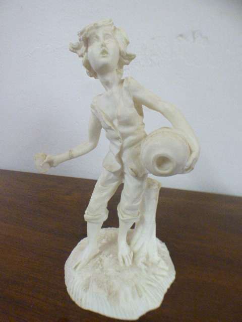 A lovely Le Ron stonelite ornamental display figurine of a young boy in great condition!!
