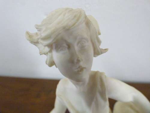 A lovely Le Ron stonelite ornamental display figurine of a young boy in great condition!!