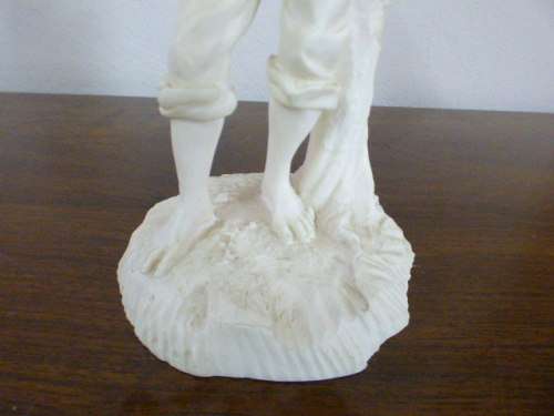 A lovely Le Ron stonelite ornamental display figurine of a young boy in great condition!!