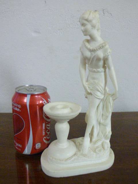 A lovely oxylite candle holder figurine of a lady in remarkable condition. Beautiful on display!!