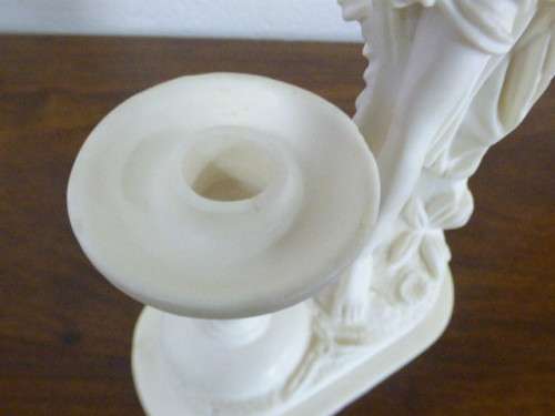 A lovely oxylite candle holder figurine of a lady in remarkable condition. Beautiful on display!!