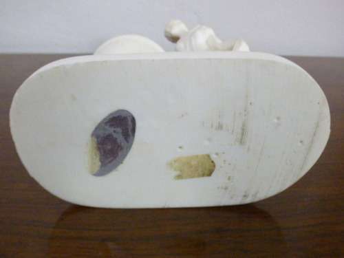 A lovely oxylite candle holder figurine of a lady in remarkable condition. Beautiful on display!!