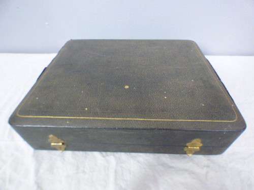 Magnificent boxed antique Royal Worcester demitasse duo's with gold detailing in silver cup holders!