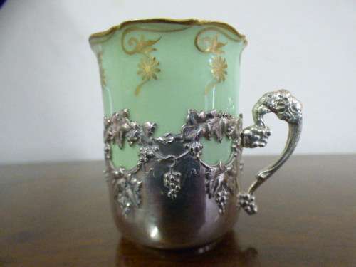 Magnificent boxed antique Royal Worcester demitasse duo's with gold detailing in silver cup holders!