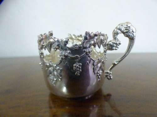 Magnificent boxed antique Royal Worcester demitasse duo's with gold detailing in silver cup holders!