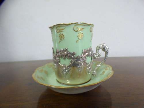 Magnificent boxed antique Royal Worcester demitasse duo's with gold detailing in silver cup holders!