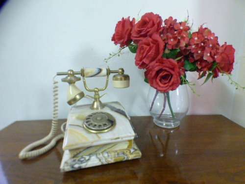 A fabulous, vintage marble and brass rotary dial telephone, stunning on display or for use.