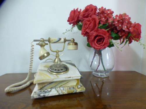 A fabulous, vintage marble and brass rotary dial telephone, stunning on display or for use.