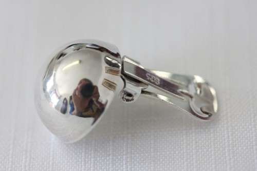 A magnificent pair of sterling silver stamped round clip-on earrings in remarkable condition