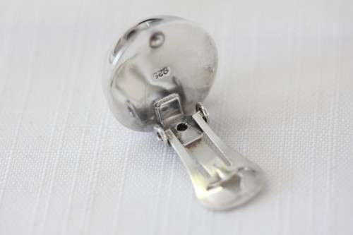 A magnificent pair of sterling silver stamped round clip-on earrings in remarkable condition