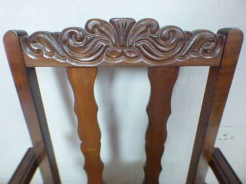 A gorgeous vintage Imbuia ball and claw hand carved arm chair, perfect in a sun room, patio, porch!!