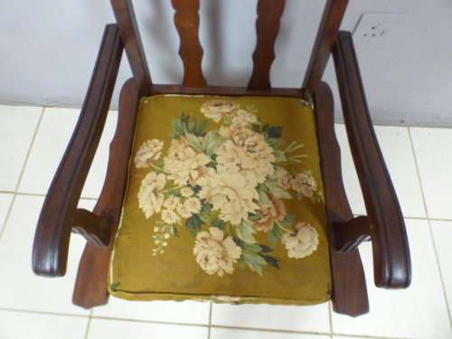 A gorgeous vintage Imbuia ball and claw hand carved arm chair, perfect in a sun room, patio, porch!!