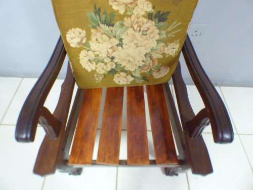 A gorgeous vintage Imbuia ball and claw hand carved arm chair, perfect in a sun room, patio, porch!!