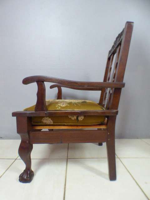 A gorgeous vintage Imbuia ball and claw hand carved arm chair, perfect in a sun room, patio, porch!!