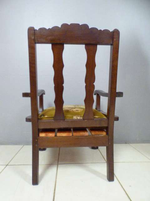 A gorgeous vintage Imbuia ball and claw hand carved arm chair, perfect in a sun room, patio, porch!!