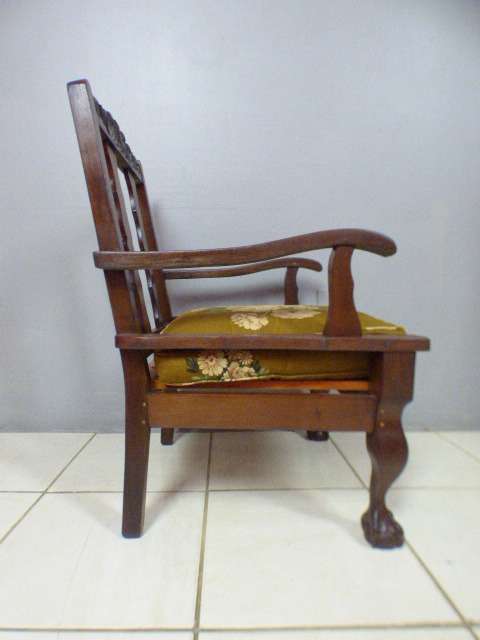 A gorgeous vintage Imbuia ball and claw hand carved arm chair, perfect in a sun room, patio, porch!!