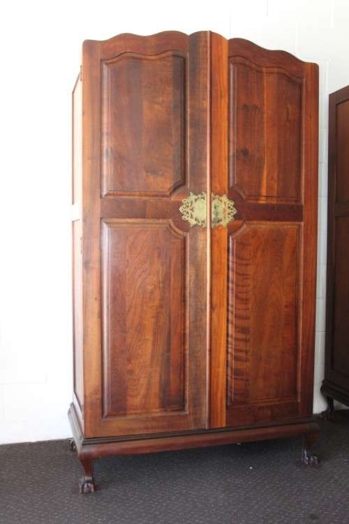 A stunning double-door solid Imbuia ball & claw wardrobe w/ solid brass embellishments & ample space