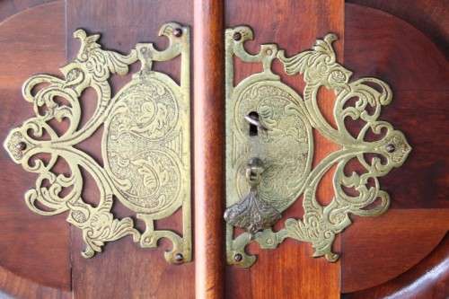 A stunning double-door solid Imbuia ball & claw wardrobe w/ solid brass embellishments & ample space