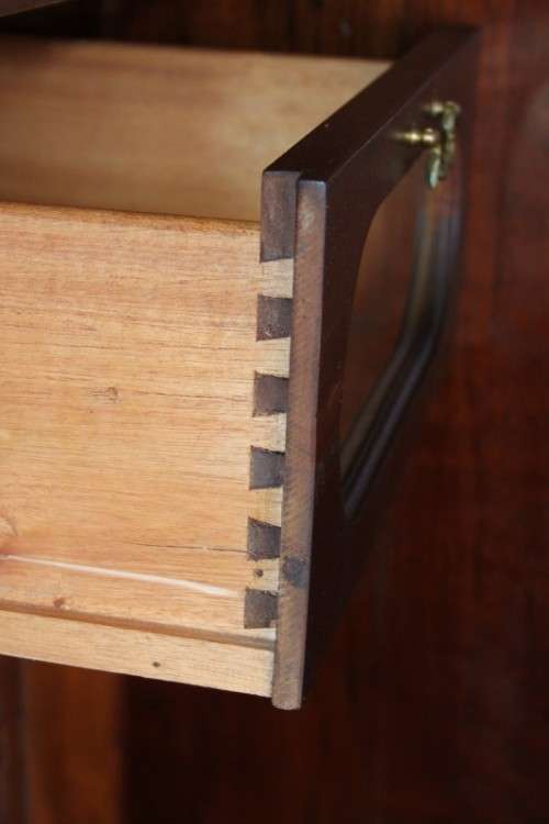 An incredible three-door solid Imbuia ball & claw wardrobe w/ solid brass embellishments