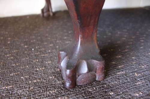 An incredible three-door solid Imbuia ball & claw wardrobe w/ solid brass embellishments