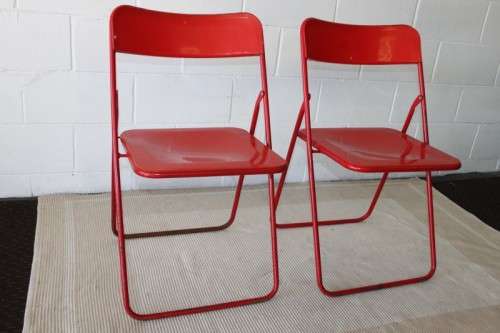 Two awesome "retro" red metal folding chairs in good condition - bid/chair