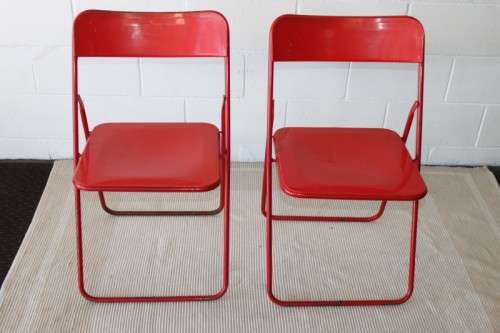 Two awesome "retro" red metal folding chairs in good condition - bid/chair
