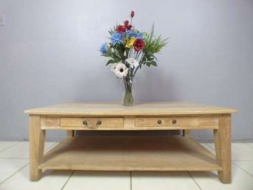 A superb (larger) light wood coffee table with four drawers - stunning!! - ideal for shabby chic too