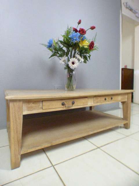 A superb (larger) light wood coffee table with four drawers - stunning!! - ideal for shabby chic too
