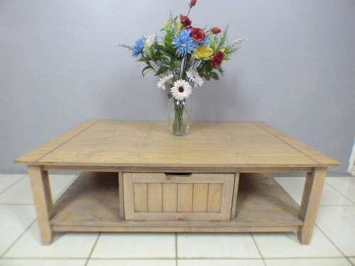 A lovely large centre coffee table w/ large cupboard in the middle; perfect to distress /shabby chic