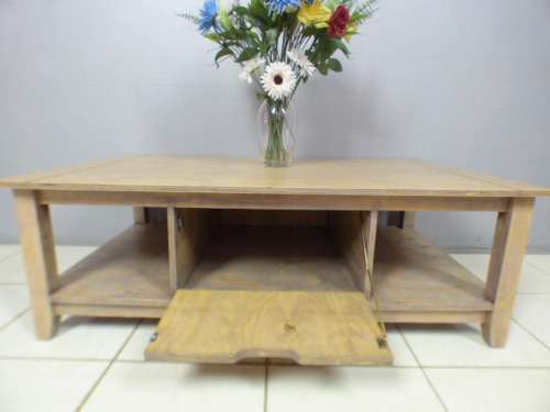 A lovely large centre coffee table w/ large cupboard in the middle; perfect to distress /shabby chic