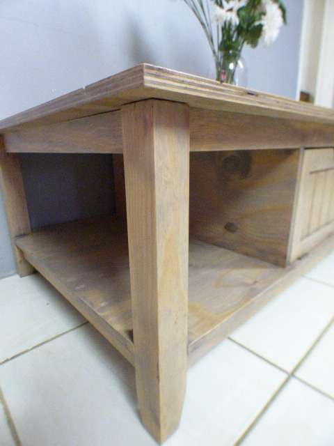 A lovely large centre coffee table w/ large cupboard in the middle; perfect to distress /shabby chic