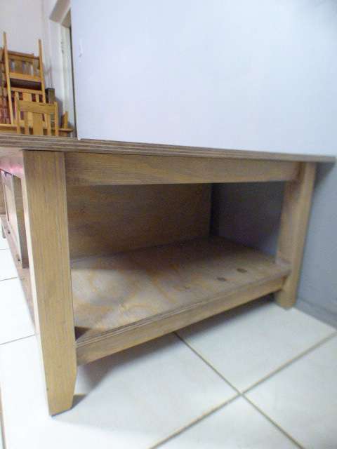 A lovely large centre coffee table w/ large cupboard in the middle; perfect to distress /shabby chic