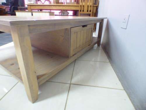 A lovely large centre coffee table w/ large cupboard in the middle; perfect to distress /shabby chic