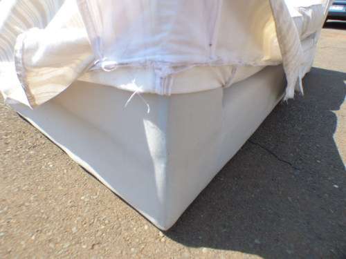 A stunning large modern styled slip covered couch in great condition. Perfect in informal lounges!