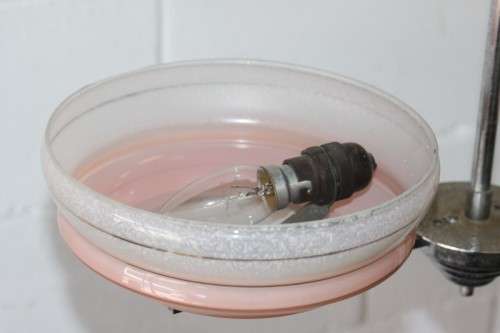 An exquisite Art Deco chrome plated ceiling lamp with stunning pink glass shades in great condition