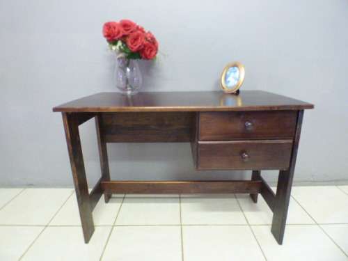 A lovely wooden writing/work desk with two spacious drawers in good condition. Perfect to paint.