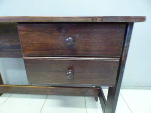 A lovely wooden writing/work desk with two spacious drawers in good condition. Perfect to paint.
