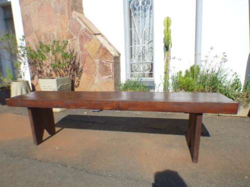 Two stunning and sturdy long wooden outdoor benches in great condition!! Bid/bench