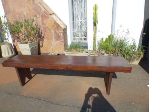 Two stunning and sturdy long wooden outdoor benches in great condition!! Bid/bench