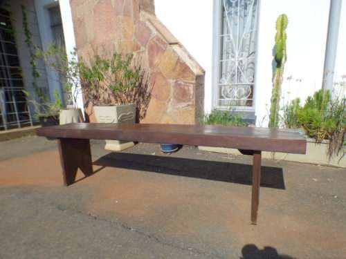 Two stunning and sturdy long wooden outdoor benches in great condition!! Bid/bench