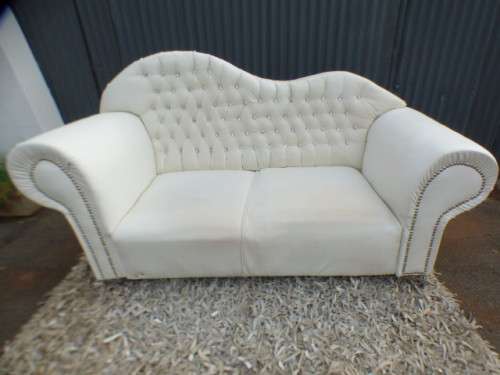 A gorgeous, quality PU leather Chesterfield style sofa w crystal like studs. MAGNIFICENT!!!