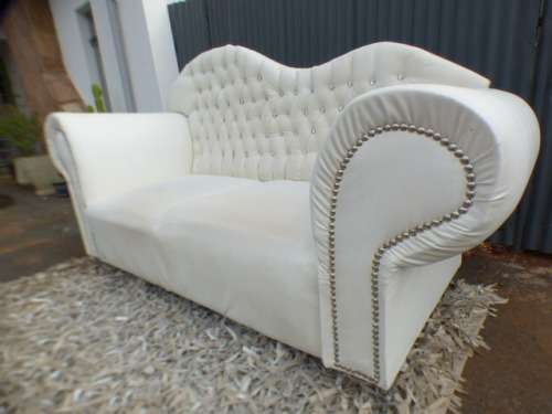 A gorgeous, quality PU leather Chesterfield style sofa w crystal like studs. MAGNIFICENT!!!